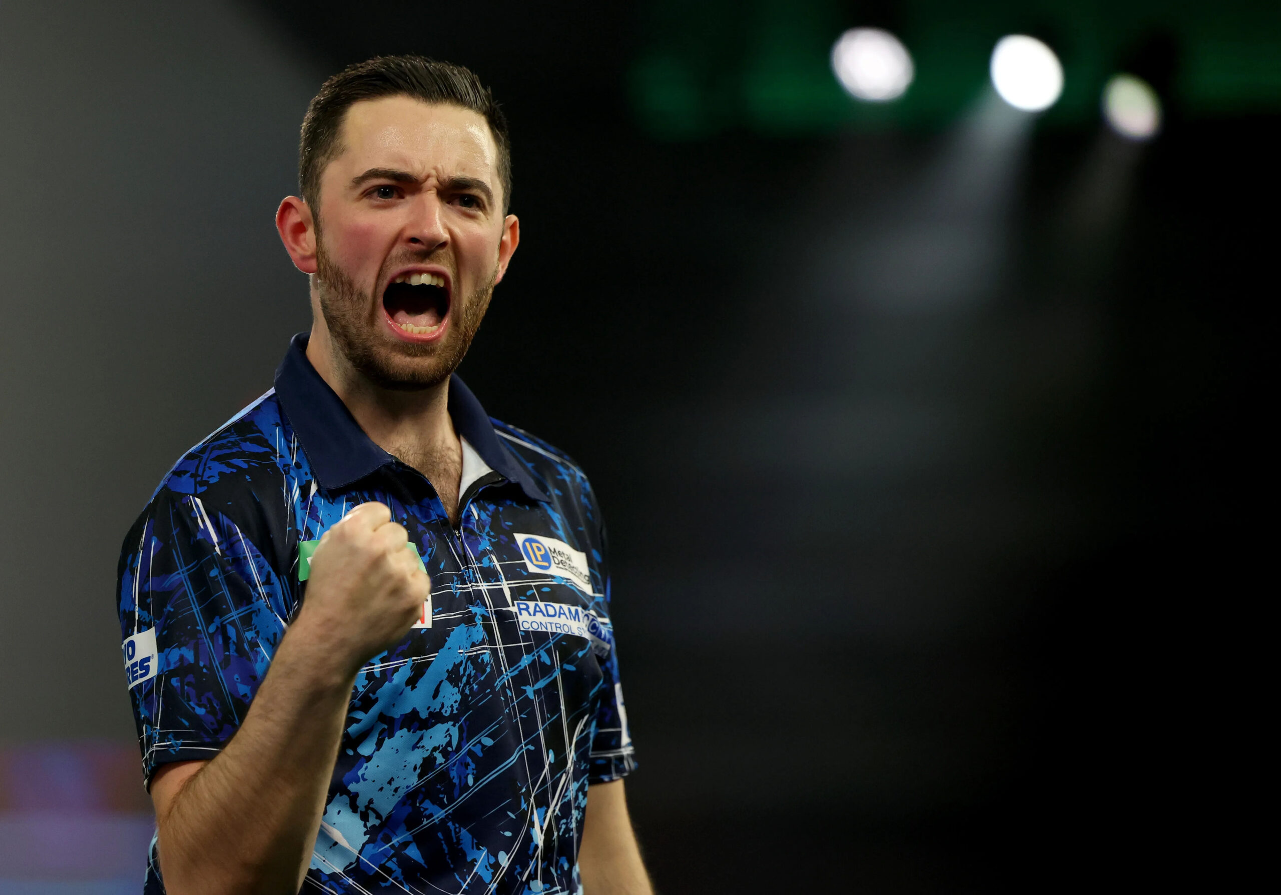 luke-humphries-england-celebrates-winning-869411208